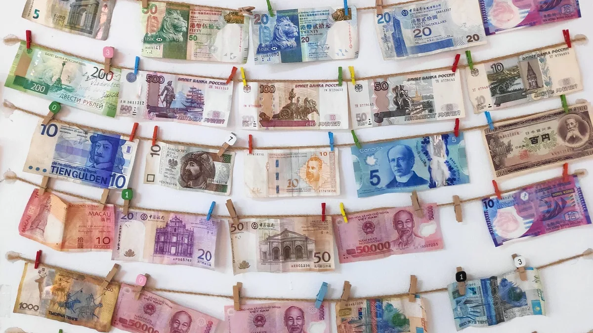 Banknotes from several countries laid side by side