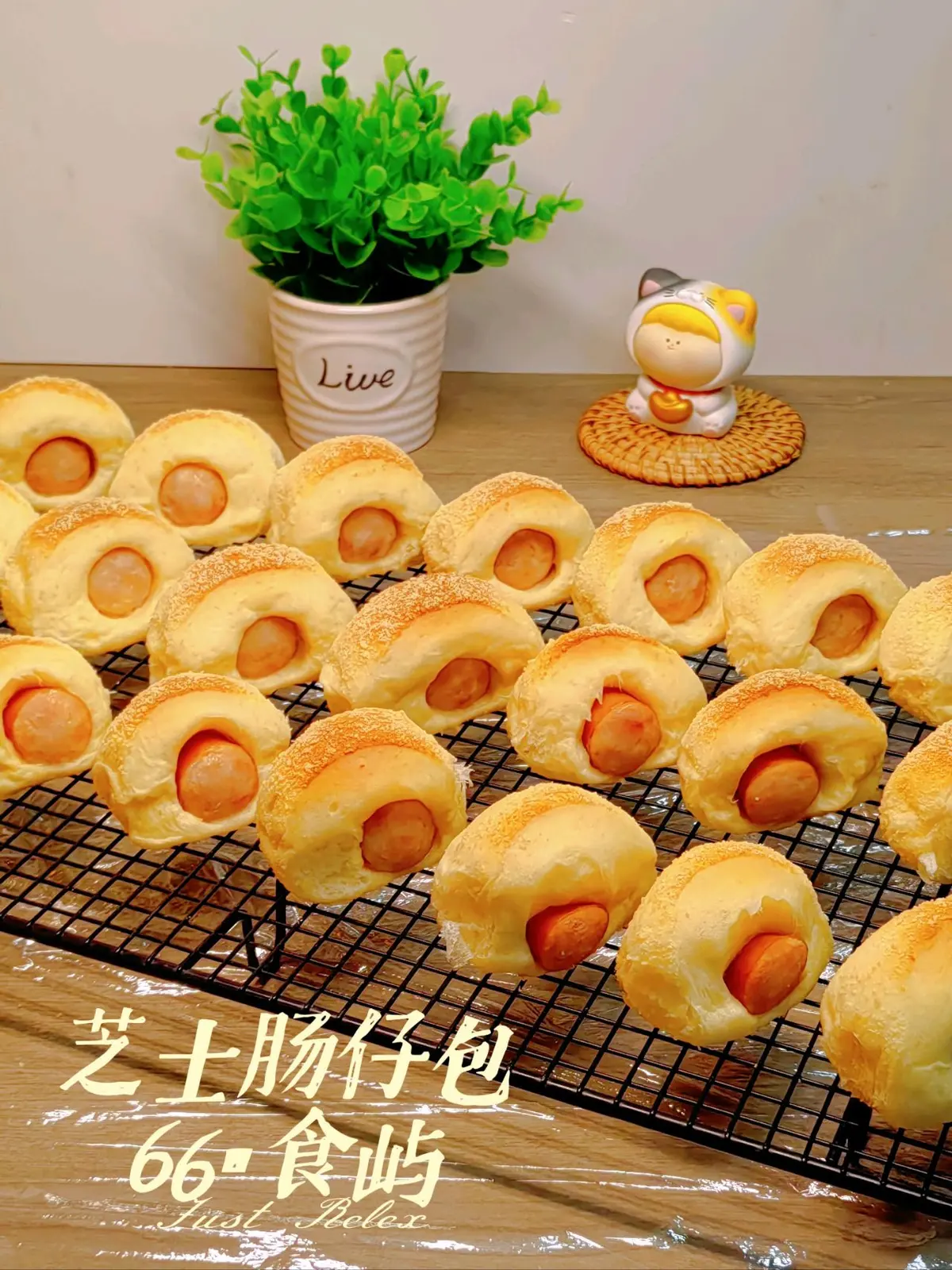 Freshly baked sausage buns dusted with cheese powder cooling on a wire rack