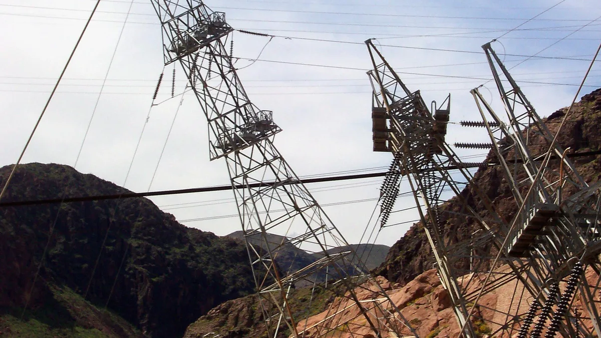 High voltage transmission towers carrying power lines
